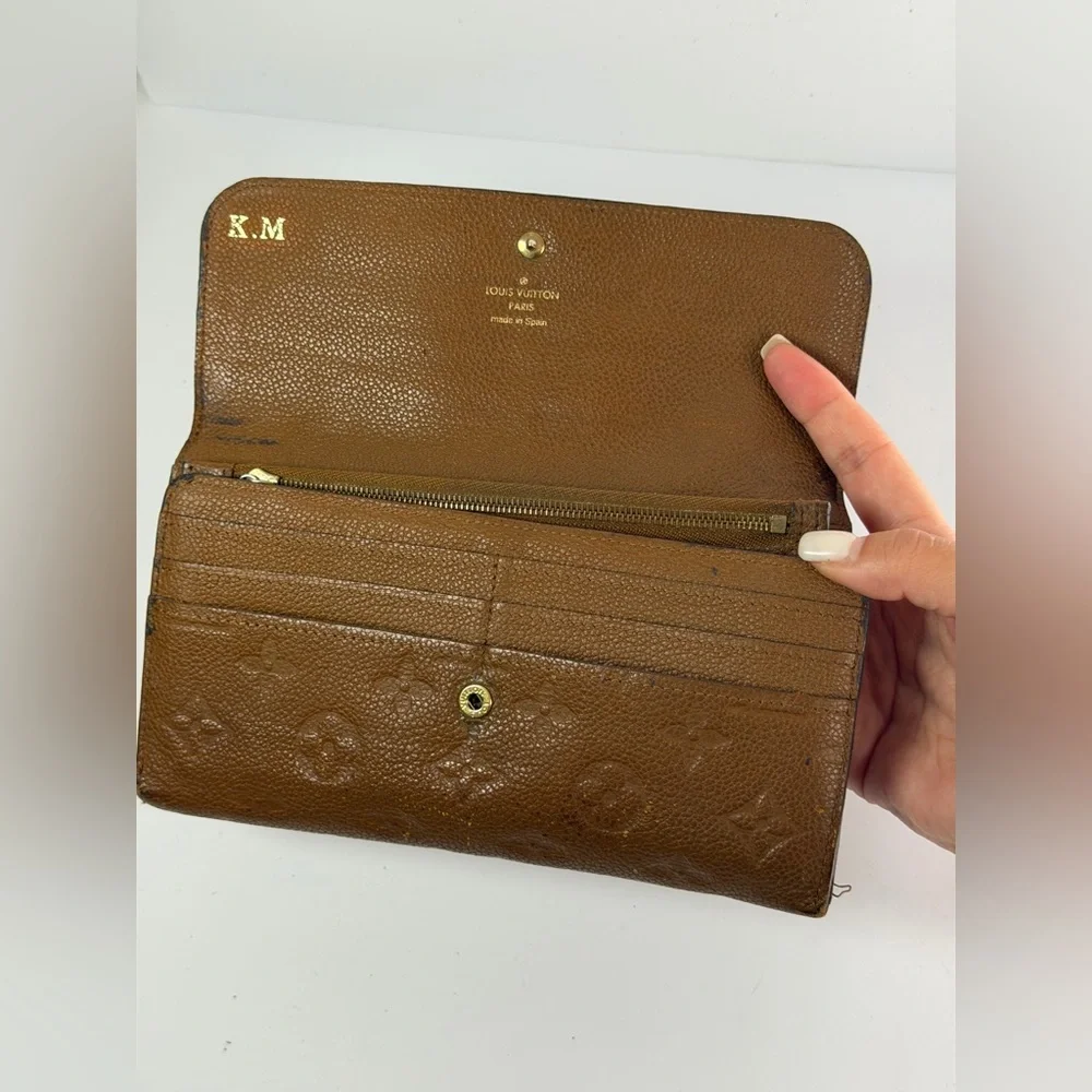 Louis Vuitton Virtuose Wallet Crafted Brown Monogram Empreinte Leather